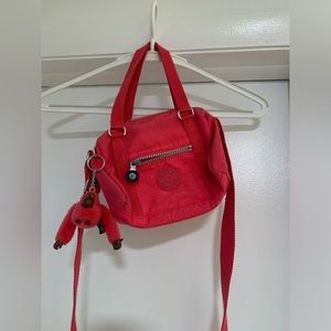 Hot Pink Kipling Purse. In good used condition